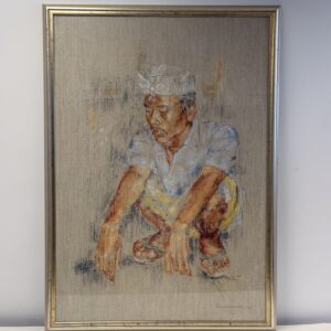Crouching Man in its silver-coloured frame
