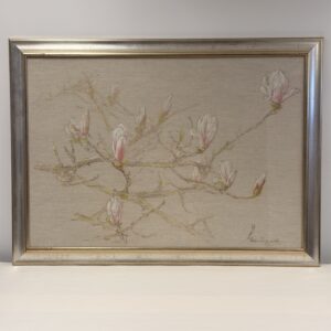 Orchids in its silver-coloured frame