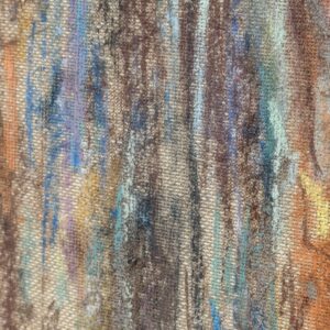 Detail of the colourful jacket and pastel chalk texture on linen